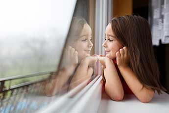 girl wondering about types of double glazing 